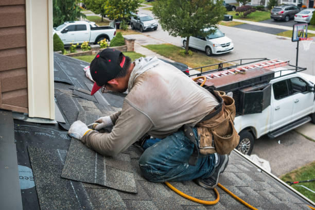 Professional Roof Replacement technician working in Saint John, IN